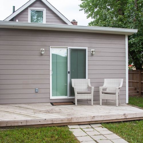 Unwind on our comfortable seats in the backyard on our open porch. It's the perfect spot to relax, surrounded by nature and fresh air
