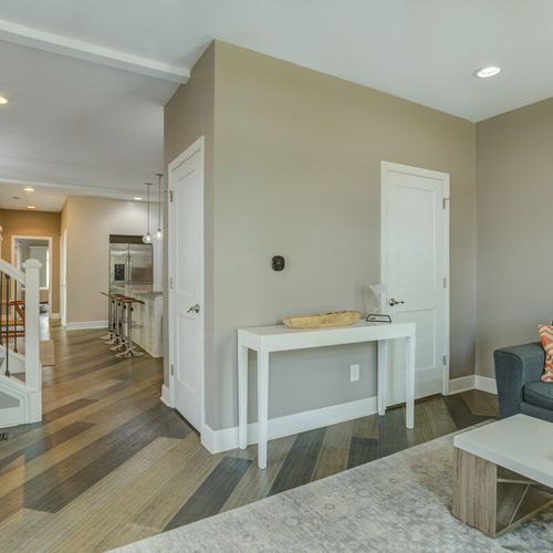 Relax and smile in this inviting hangout area with soft, beautiful sofas and couches—a perfect spot to read books and unwind.