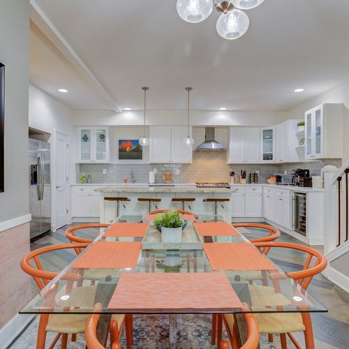This cute dining area, featuring a four-seater dining table, is truly impressive and exceptional. The charm of the setup invites you to enjoy delightful meals in a cozy and stylish atmosphere.