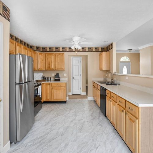 Our kitchen is not just a cooking space; it's a clean and thoughtfully designed haven equipped with kitchen essentials and utensils.