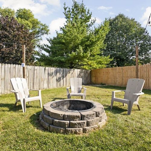The fire pit is ready for action. Grab a spot, enjoy the crackling fire, and let's turn up the fun.