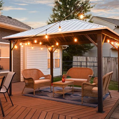 Take a moment to relax and unwind in our outdoor space – we've set up comfortable furniture just for you.