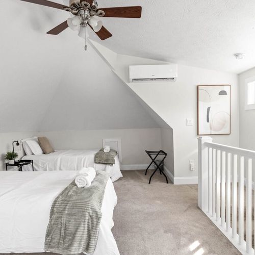 Experience the charm of our cozy and elegantly designed bedroom, adorned with fresh linens, soft pillows, and a welcoming atmosphere that invites relaxation.