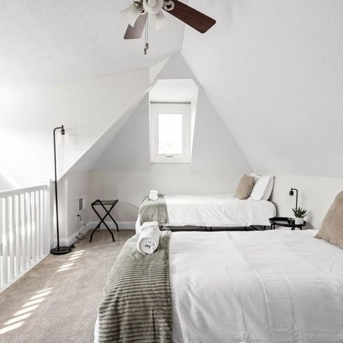 Experience the charm of our cozy and elegantly designed bedroom, adorned with fresh linens, soft pillows, and a welcoming atmosphere that invites relaxation.