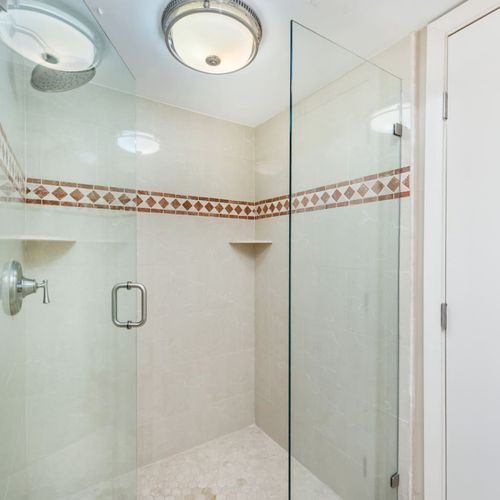 Full bathroom features a walk in Shower