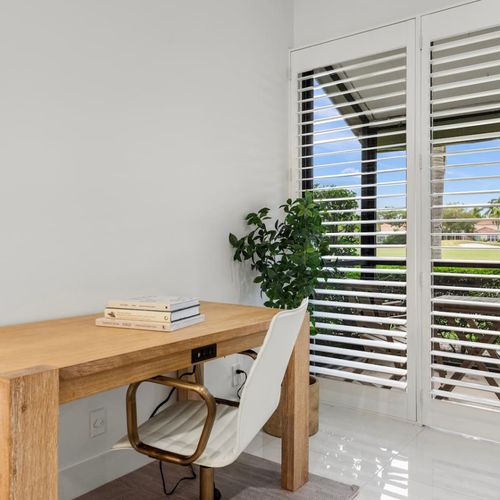Dedicated workspace overlooking the golf course.