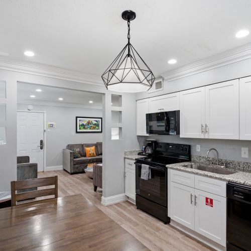 Stylish kitchen w/ sleek finishes & a dining nook to enjoy every meal.