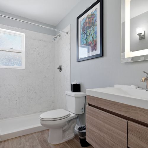 Unit 307 – Bright bathroom w/ sink & essentials to start your day feeling fresh.