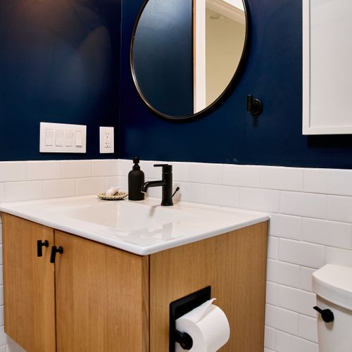 This full bath is off the upstairs hallway in the main house, shared by the two guest bedrooms.