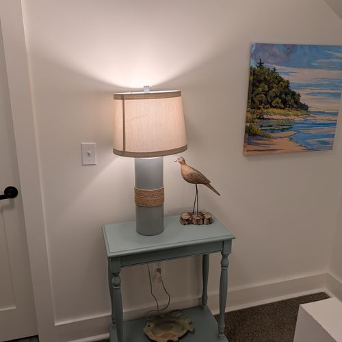 FOYER (SECOND FLOOR):  At the top of the stairs there is a foyer outside of the two bedrooms, which provides additional storage space for belongings.