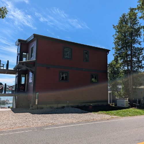 EXTERIOR:  The front of Eagles Landing, highlighting the parking area.