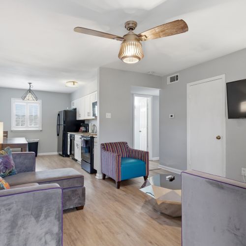 Modern living area w/ a smart TV & stylish seating to unwind.