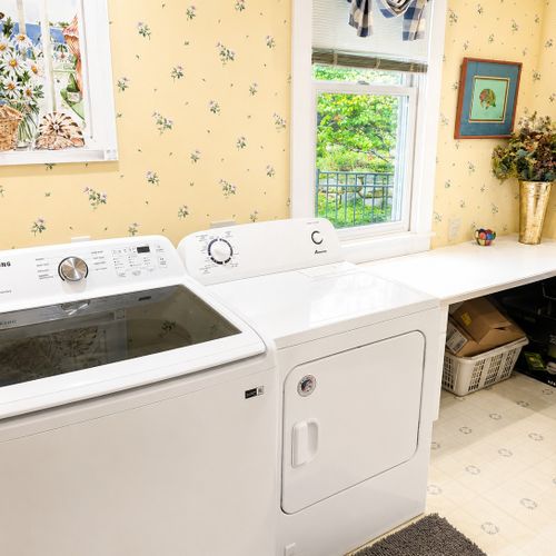 LAUNDRY ROOM / OFFICE (FIRST FLOOR):  Very useful main floor laundry room and office