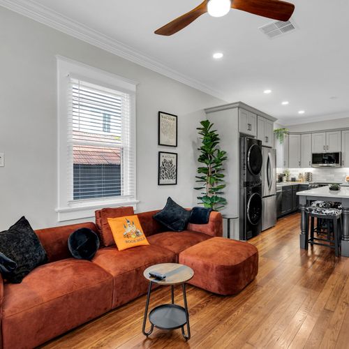 Open, flowing layout connects the cozy living room to the kitchen so everyone stays together