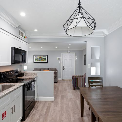 Unit 201 kitchen — cook, dine & settle in w/ everything you need.