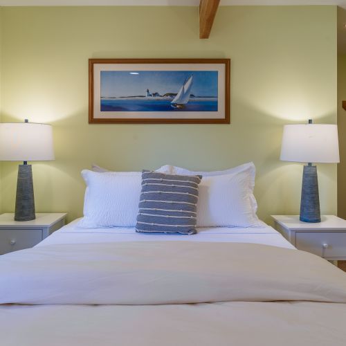 Retreat to the spacious primary suite featuring a plush king bed, walk-in closet, and plenty of room to relax after a day of exploring Orcas Island.
