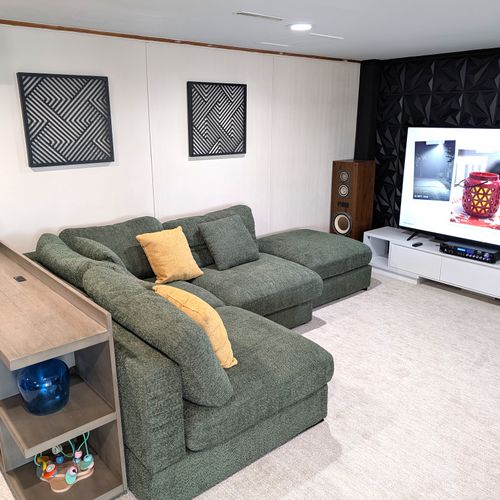 RECREATION ROOM (LOWER LEVEL):  The home has a very cute and fun recreation room in the lower level that is complete with a wet bar and mini-frig.