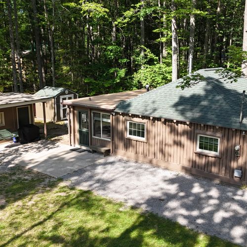 EXTERIOR:  Aerial photo of the side of the cabin.