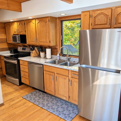KITCHEN (SECOND FLOOR):  The home has a full kitchen with all appliances including a dishwasher.