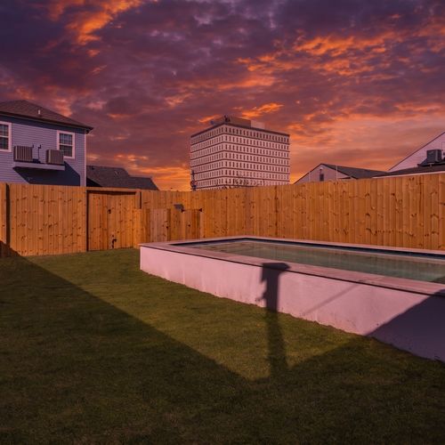 Plunge pool surrounded by open sky — a refreshing cool-down on a warm day.