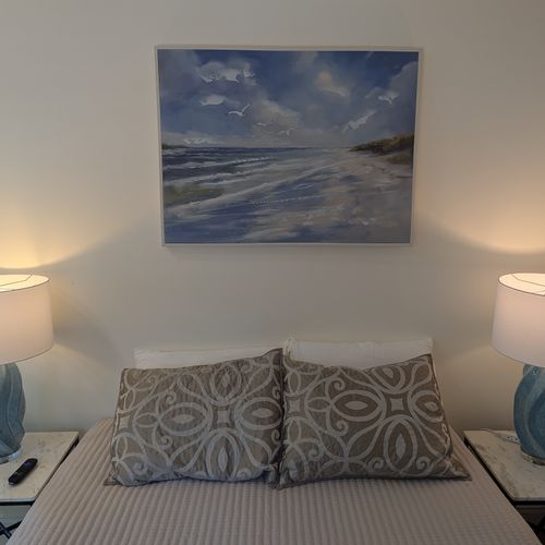 OVERVIEW: The comfy full-size bed with smart TV to watch while relaxing