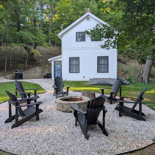 OVERVIEW:  The gorgeous private bonfire ring in the front yard wtih the house in the background.