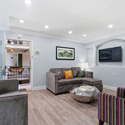 Airy living area w/ Smart TV & stylish, modern touches.