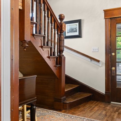 STAIRS - HOUSE: This is the beautiful stairway up to the second floor