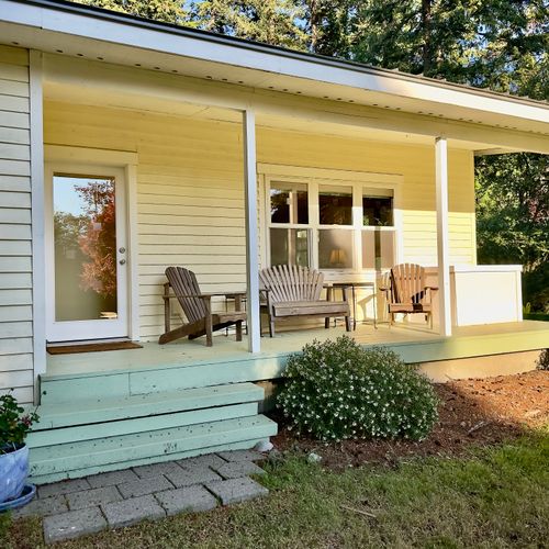 Unwind with your morning coffee or an evening drink on the covered back porch overlooking the peaceful yard.