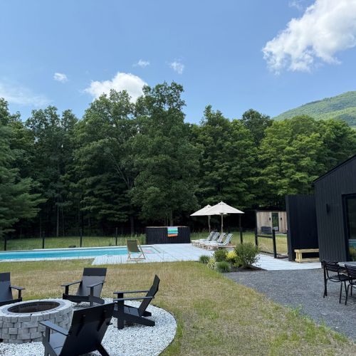 Gather poolside around the fire pit, with sweeping mountain and forest views all around.