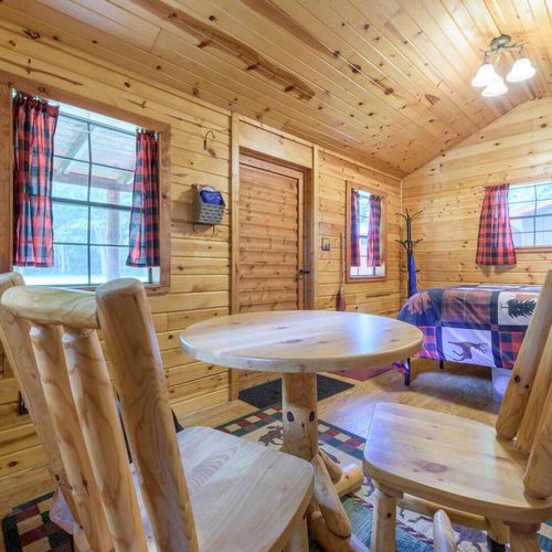CABIN #1:  Cute little woodsy log cabin with a queen-size bed.  Mini-split unit included for heat and A/C.
