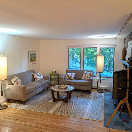 LIVING ROOM #2 (SECOND FLOOR):  Features a sofa, loveseat, coffee table, and television.  (Note that the wood fireplace is not available for guest usage.)