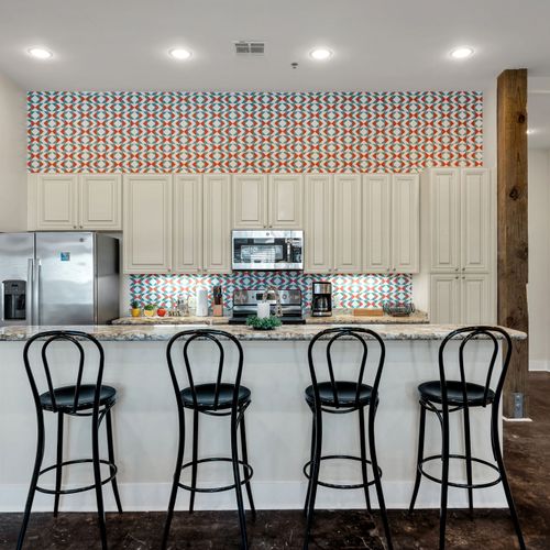 Bistro stools lined up at the breakfast bar