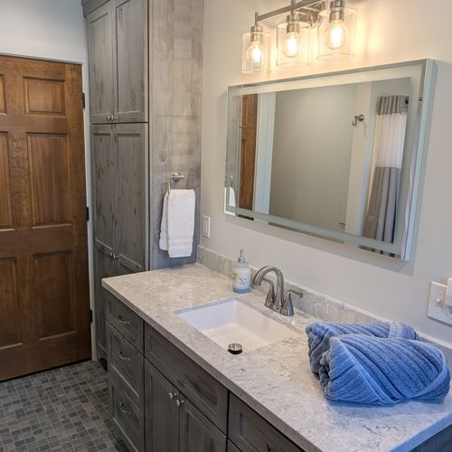BATHROOM #2 (THIRD FLOOR):  Full bathroom with a combination tub and shower.  Note that the laundry closet is also in a closet within this bathroom.