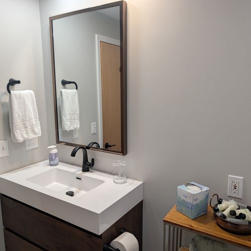 BATHROOM #1 (FIRST FLOOR):  Full bathroom on the first floor with a walk-in shower.