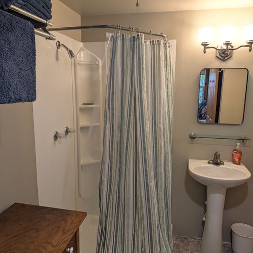 BATHROOM: The full-bathroom offering a cute shower with all the essentials