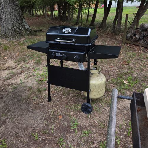 EXTERIOR:  The backyard propane grill