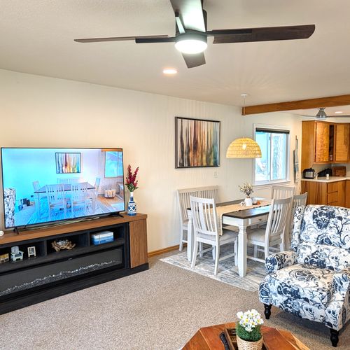 LIVINING ROOM (MAIN FLOOR):  Large and beautiful living room on the main floor with a great view of Bass Lake.