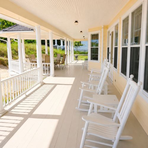 EXTERIOR:  Another view of the back porch, which has spectacular views of Lake Michigan and the Frankfort Lighthouse