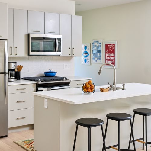 The guest house kitchen, with island and stool seating.