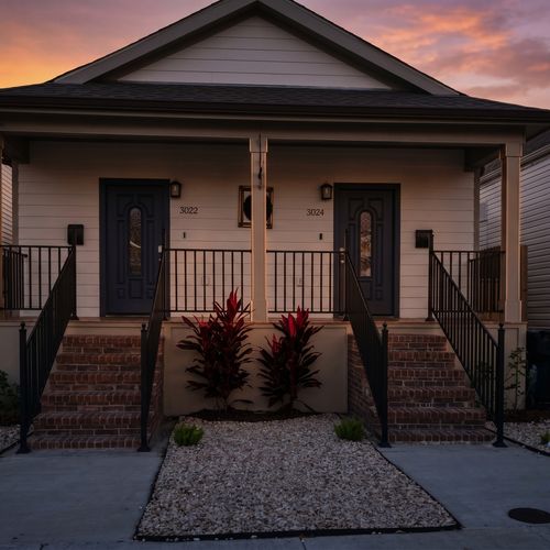 Charming landscaped front entrance that sets a warm welcome before you even step inside.