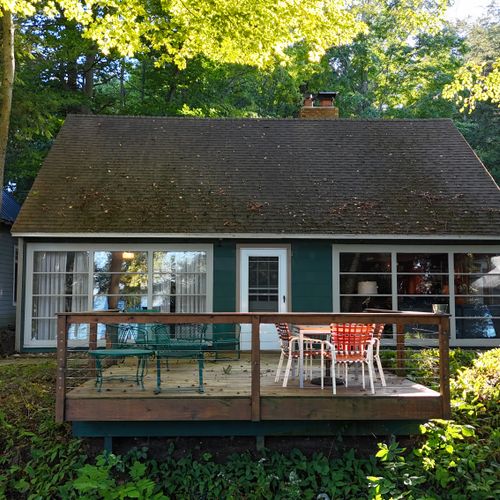 EXTERIOR:  Aerial view of the back of the house and private deck.
