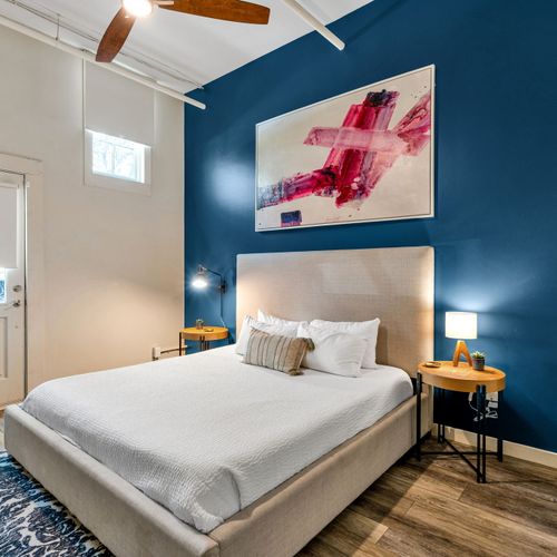 Navy and white bedroom with a modern edge