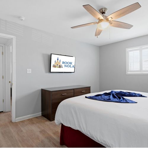 Cozy king bedroom with smart TV