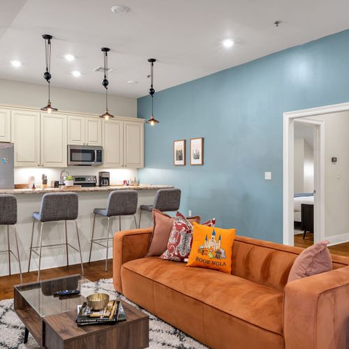 Burnt orange velvet and sky blue walls set the mood