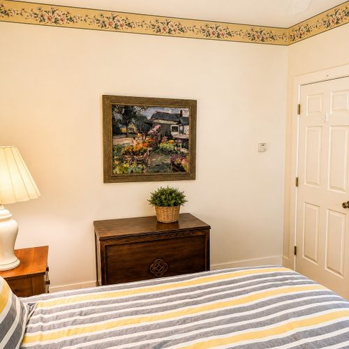 BEDROOM #1 (FIRST FLOOR):  Convenient bedroom on the main floor with a queen-size bed.