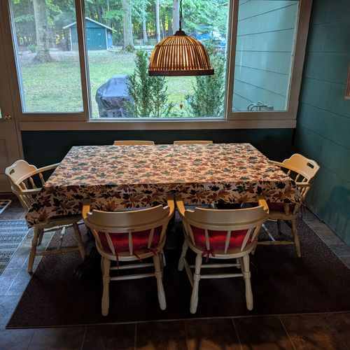 DINING AREA (MAIN FLOOR):  The dining area is just inside the front door at the front of the house.