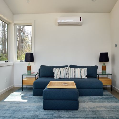 This sofa in the pool house pulls out to a full size bed, allowing for room for further accommodation.