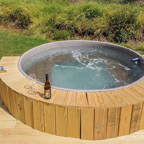 Soak away your worries in the hot tub surrounded by nature