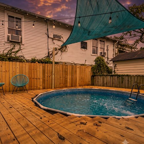 Cool off in the sparkling above-ground pool — your own backyard oasis.